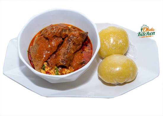Eba with Egusi, Stewed Beef, Assorted & Stewed Ponmo