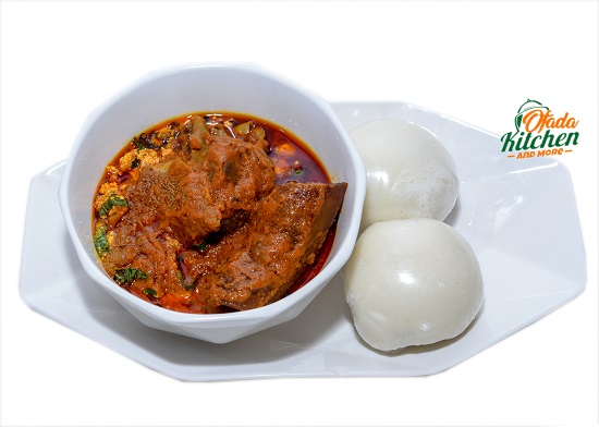 Pounded Yam with Egusi, Stewed Goat Meat & Ponmo